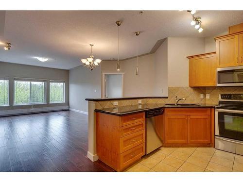 409-20 Discovery Ridge Close Sw, Calgary, AB - Indoor Photo Showing Kitchen