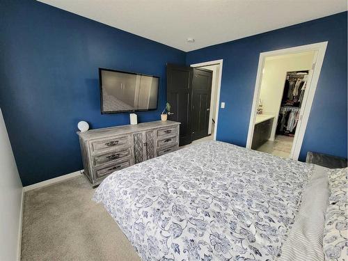 208 South Point Park, Airdrie, AB - Indoor Photo Showing Bedroom