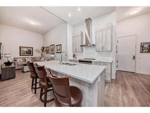 113-24 Mahogany Path Se, Calgary, AB - Indoor Photo Showing Kitchen With Double Sink