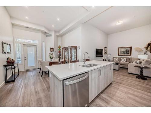 113-24 Mahogany Path Se, Calgary, AB - Indoor Photo Showing Kitchen With Double Sink