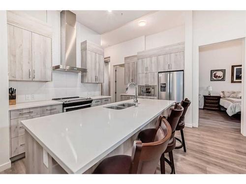 113-24 Mahogany Path Se, Calgary, AB - Indoor Photo Showing Kitchen With Double Sink With Upgraded Kitchen