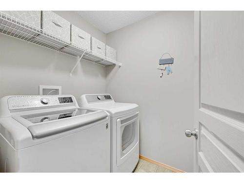 78 Bridlecrest Boulevard Sw, Calgary, AB - Indoor Photo Showing Laundry Room