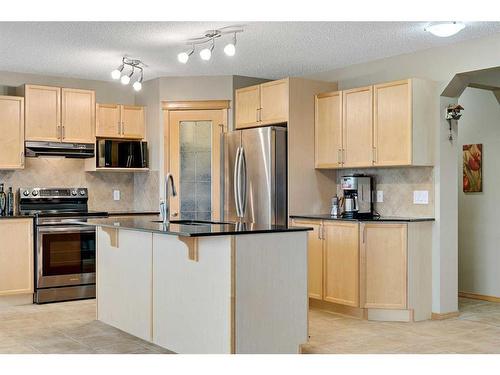 78 Bridlecrest Boulevard Sw, Calgary, AB - Indoor Photo Showing Kitchen With Stainless Steel Kitchen