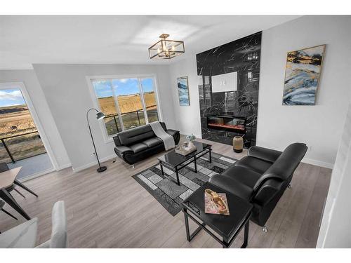 145 Amblefield Terrace Nw, Calgary, AB - Indoor Photo Showing Living Room