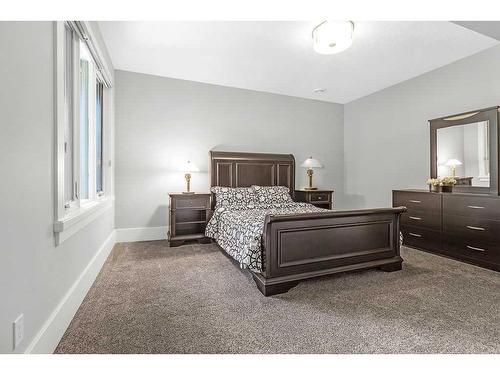 32 Aspen Ridge Manor Sw, Calgary, AB - Indoor Photo Showing Bedroom