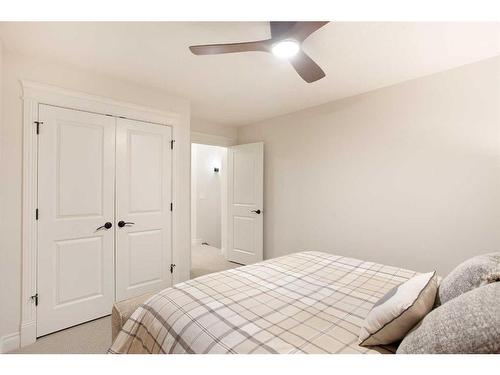 1149 Coopers Drive Sw, Airdrie, AB - Indoor Photo Showing Bedroom