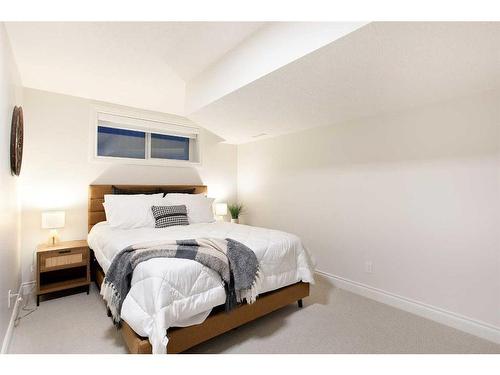 1149 Coopers Drive Sw, Airdrie, AB - Indoor Photo Showing Bedroom