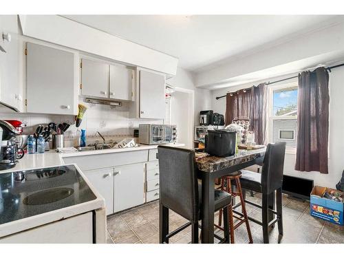 1501,1507,1511,1515 35 Street Se, Calgary, AB - Indoor Photo Showing Kitchen With Double Sink