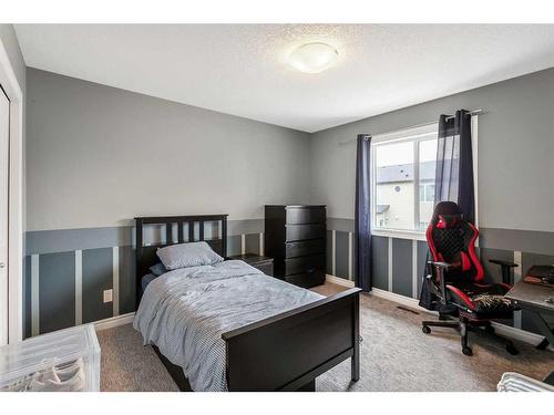 169 Bridlerange Circle Sw, Calgary, AB - Indoor Photo Showing Bedroom