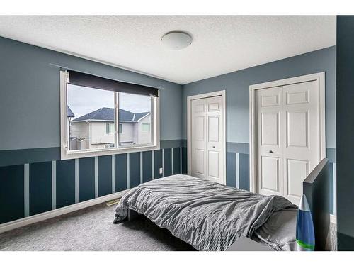 169 Bridlerange Circle Sw, Calgary, AB - Indoor Photo Showing Bedroom