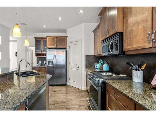 169 Bridlerange Circle Sw, Calgary, AB - Indoor Photo Showing Kitchen With Double Sink With Upgraded Kitchen