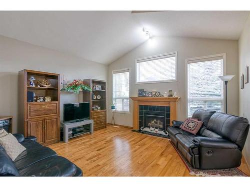 513 Citadel Way Nw, Calgary, AB - Indoor Photo Showing Living Room With Fireplace