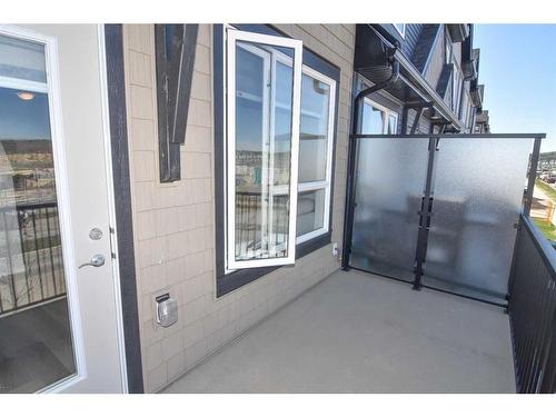 828 Belmont Drive Sw, Calgary, AB - Outdoor With Balcony With Exterior