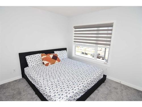 828 Belmont Drive Sw, Calgary, AB - Indoor Photo Showing Bedroom