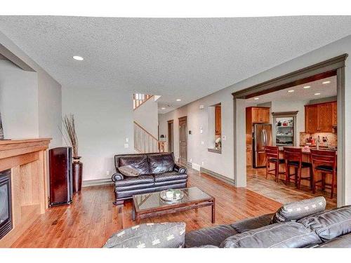 182 Evanspark Circle Nw, Calgary, AB - Indoor Photo Showing Living Room With Fireplace