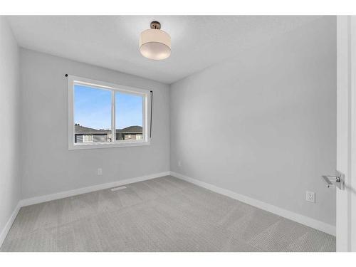 132 Chelsea Glen, Chestermere, AB - Indoor Photo Showing Other Room