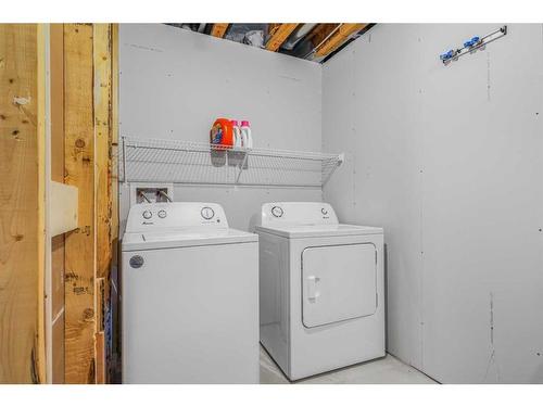 32 Creekstone Drive Sw, Calgary, AB - Indoor Photo Showing Laundry Room