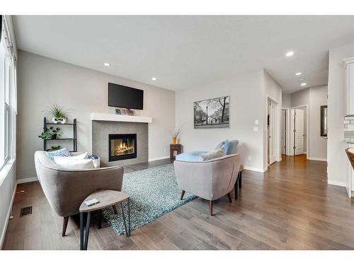 1025 Brightoncrest Common Se, Calgary, AB - Indoor Photo Showing Living Room With Fireplace
