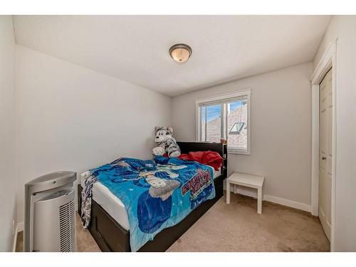 8 Strathlea Close Sw, Calgary, AB - Indoor Photo Showing Bedroom