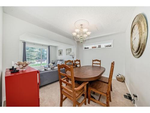 8 Strathlea Close Sw, Calgary, AB - Indoor Photo Showing Dining Room