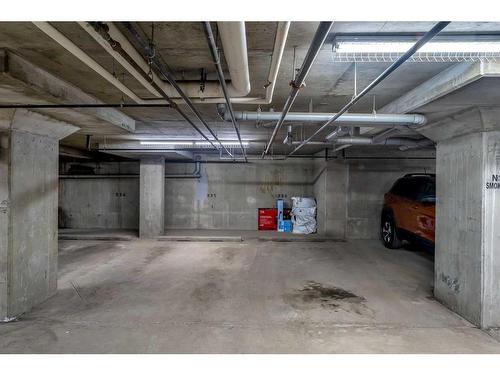 121-7210 80 Avenue Ne, Calgary, AB - Indoor Photo Showing Garage