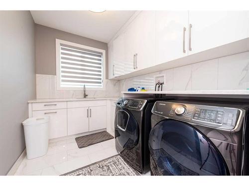 111 Sandpiper Court, Chestermere, AB - Indoor Photo Showing Laundry Room