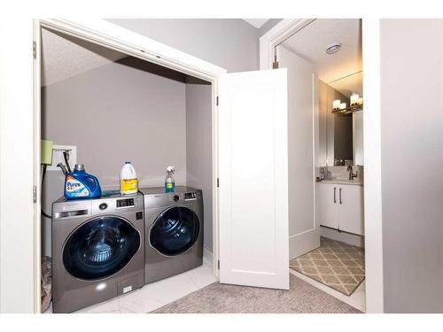 111 Sandpiper Court, Chestermere, AB - Indoor Photo Showing Laundry Room