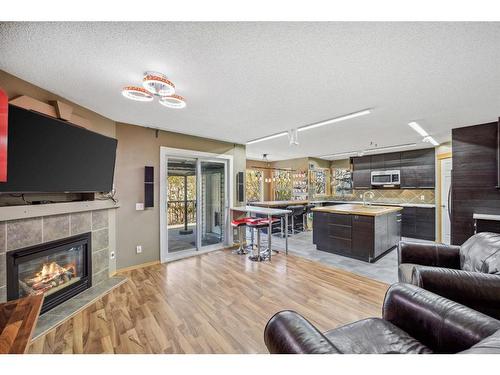 167 Panorama Hills Way Nw, Calgary, AB - Indoor Photo Showing Living Room With Fireplace