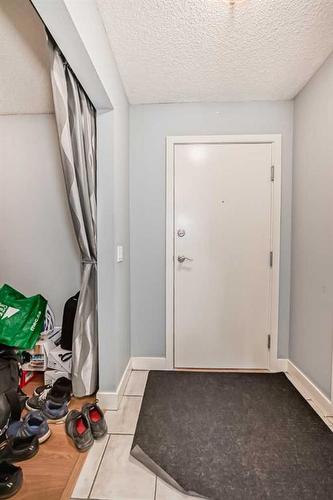 348-35 Richard Court Sw, Calgary, AB - Indoor Photo Showing Other Room