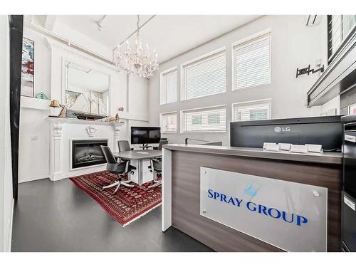 203-1117 1 Street Sw, Calgary, AB - Indoor With Fireplace