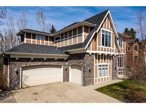 8 Spring Willow Place Sw, Calgary, AB - Outdoor With Facade