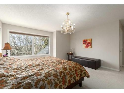 8 Spring Willow Place Sw, Calgary, AB - Indoor Photo Showing Bedroom
