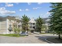 2202-11 Chaparral Ridge Drive Se, Calgary, AB  - Outdoor With Balcony With Facade 