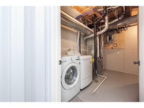 2329 50 Street Ne, Calgary, AB - Indoor Photo Showing Laundry Room