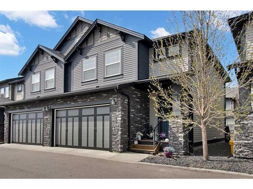 203-110 Coopers Common Sw, Airdrie, AB - Outdoor