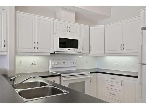 1116-48 Inverness Gate Se, Calgary, AB - Indoor Photo Showing Kitchen With Double Sink