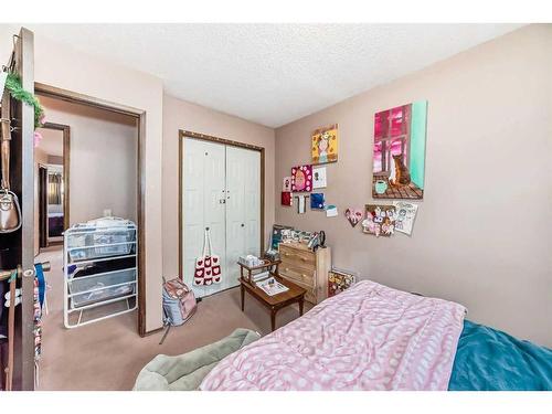 43 Ranchridge Drive Nw, Calgary, AB - Indoor Photo Showing Bedroom