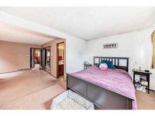 43 Ranchridge Drive Nw, Calgary, AB - Indoor Photo Showing Bedroom