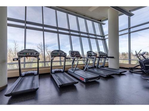 604-99 Spruce Place Sw, Calgary, AB - Indoor Photo Showing Gym Room