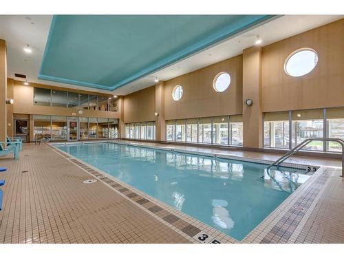 604-99 Spruce Place Sw, Calgary, AB - Indoor Photo Showing Other Room With In Ground Pool