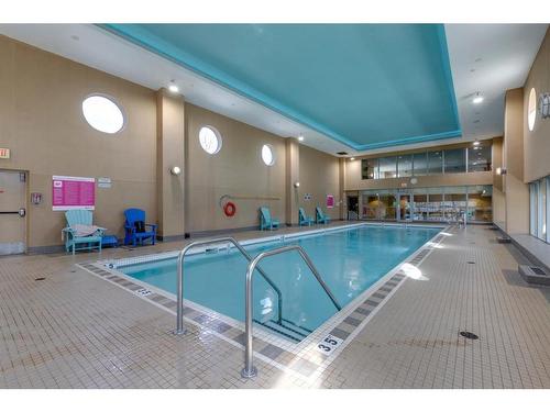 604-99 Spruce Place Sw, Calgary, AB - Indoor Photo Showing Other Room With In Ground Pool