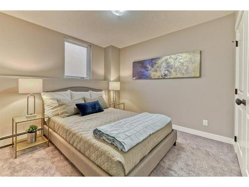 13-606 Lakeside Boulevard, Strathmore, AB - Indoor Photo Showing Bedroom