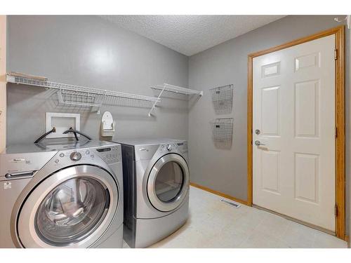 92 Mt Aberdeen Circle Se, Calgary, AB - Indoor Photo Showing Laundry Room