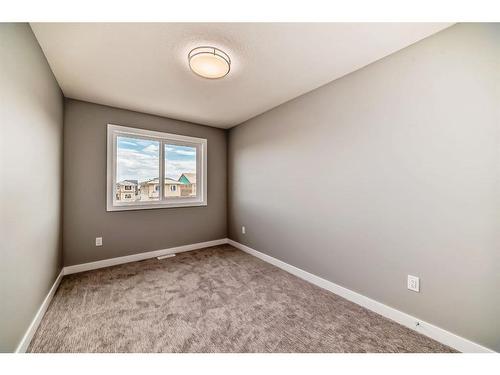 253 Midgrove Mews Sw, Airdrie, AB - Indoor Photo Showing Other Room