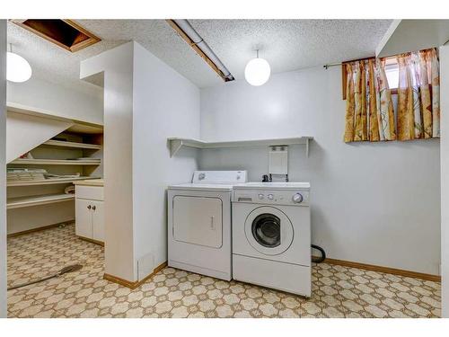 119 Rundlecairn Road Ne, Calgary, AB - Indoor Photo Showing Laundry Room