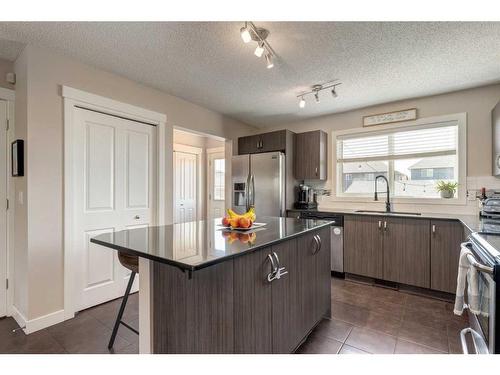9 Legacy Gate Se, Calgary, AB - Indoor Photo Showing Kitchen With Stainless Steel Kitchen With Upgraded Kitchen