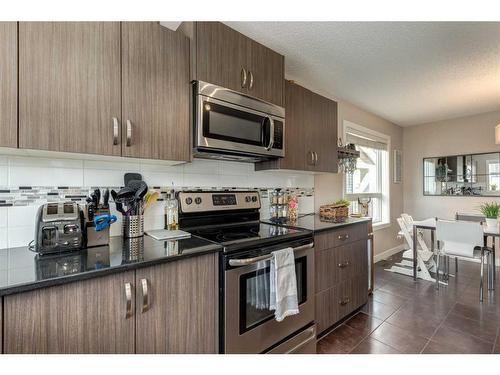 9 Legacy Gate Se, Calgary, AB - Indoor Photo Showing Kitchen With Stainless Steel Kitchen