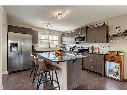 9 Legacy Gate Se, Calgary, AB - Indoor Photo Showing Kitchen With Stainless Steel Kitchen
