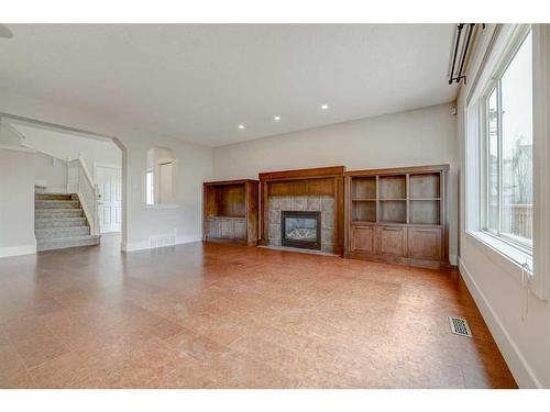 139 Cranwell Crescent Se, Calgary, AB - Indoor Photo Showing Living Room With Fireplace