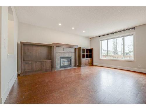 139 Cranwell Crescent Se, Calgary, AB - Indoor Photo Showing Living Room With Fireplace